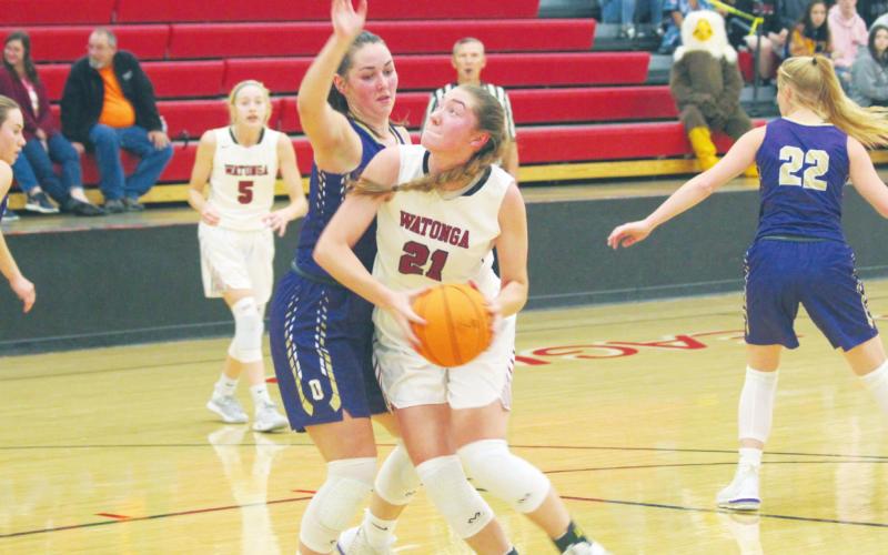 Former Watonga High School Lady Eagles' standout forward Cacie Gorman (21) attempts to score in the paint on Dec. 3, 2019, during a game vs. Okarche High School. Gorman will continue her basketball career 2020-21 season when she plays women's basketball at Univeristy of Arkansas - Fort Smith. Andrew Salmi | Watonga Republican