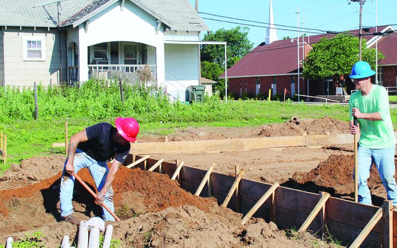 The City of Watonga became the site for the first stateside build of a Zona Verde home. A second home is planned at the site of the gray house in the background.