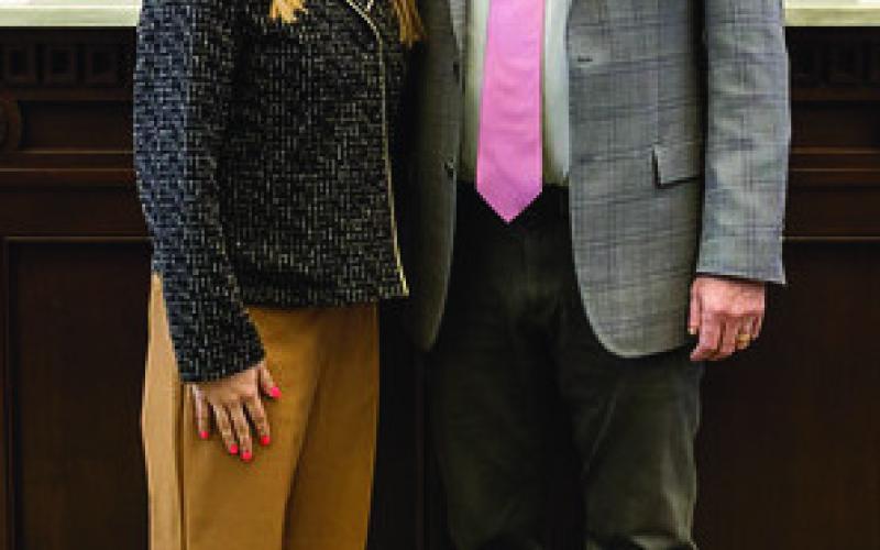 Avery Fisher, (L), with Rep. Mike Dobrinski, both of Okeene. Fisher served as a page for Dobrinksi during the Legislative session.