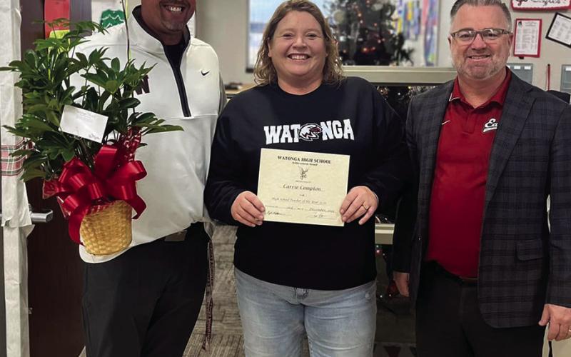 Watonga Public Schools recently named the district’s teachers of the year. Above are high school principal Todd Overstreet, high school teacher of the year Carrie Compton and superintendent Kyle Hilterbran.
