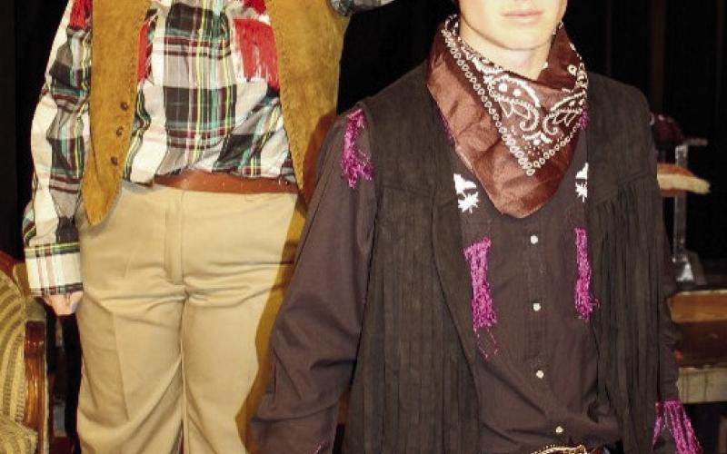 Sheriff Lovelace, played by Mya O’Dell tries to capture villain Snipe Vermin played by Brayden Cowan.