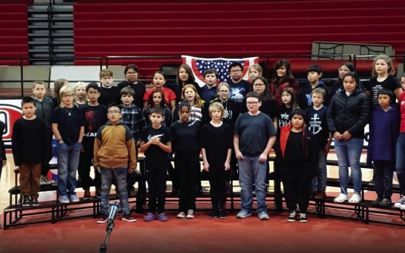 Area veterans were honored at a patriotic program Friday on Veterans' Day. Students presented songs, poems, readings, and held a flag folding ceremony. The Middle and High School band played the National Anthem, Stars and Stripes Forever, and America the Beautiful. We thank our veterans for attending, and for their service to our country. The photo features the 4th and 5th grade chorus.