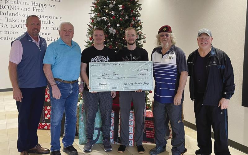 Members of the Watonga Masons recently presented a $1,000 check to WHS principal Todd Overstreet (L) and band leaders Shane Johnson and Lincoln Spurlin (C). The money was raised at the Mason’s Pancake Breakfast and is to benefit the music program. The band leaders were in sweats because it was ‘Wear Your Pyjamas to School Day.’ Photos provided by Watonga Public Schools