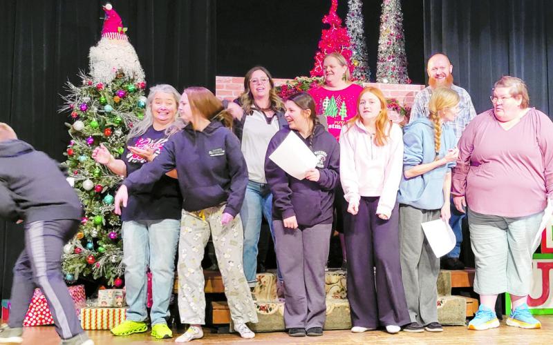 Cord Cowan, Karrie Beth Little, Jersey Wilcoxson, Taylor Coney, Delilah Fritz, Corry Rogers, Caleigh Scheihing, Kristen Ashby, Jeremiah Rogers, Amy Adams, Josh Cox, Karen Gilliland rehearse the opening scene of That's Christmas to Me which debuts at 2:30 and 7:30 p.m. Sunday, Dec. 15 and at 7:30 p.m. Monday, Dec. 16 at Watonga Community Theatre.