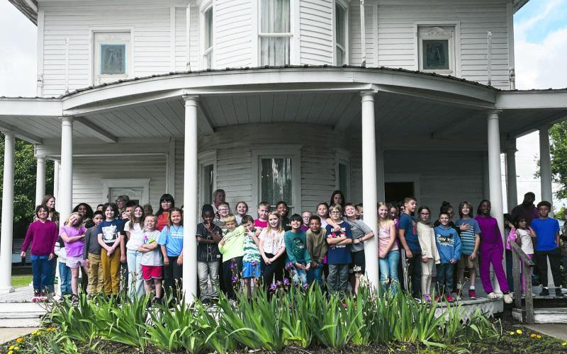 (ABOVE) The entire third grade from Watonga Elementary School came to the T.B. Ferguson Home Museum Friday for a tou. They learned about one-way windows, being shot at, and how a butter churn worked, among other things.