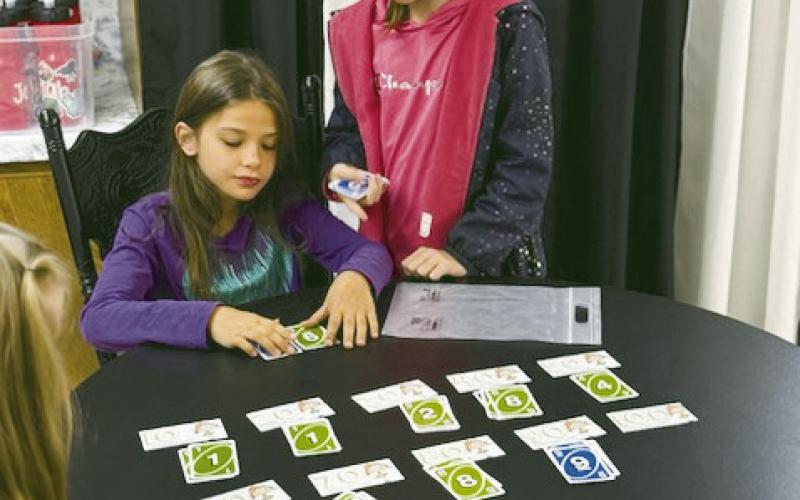 BELOW AT RIGHT: Third graders held a rounding workshop where they became experts at rounding.