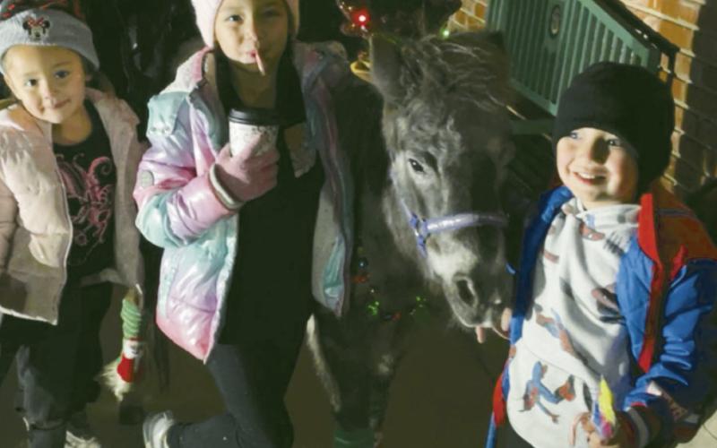 Kids, Santa and even a pony were out Saturday night at a cold CentennialParkfortheannuallightingoftheWatongaChristmastree. PhotoscourtesyCityofWatonga