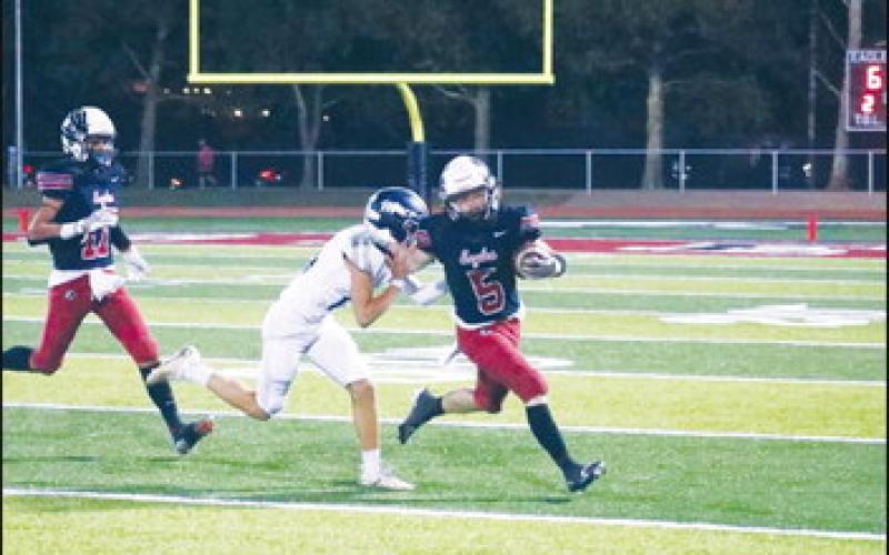 Dakota Morris running the ball after a catch (Photos provided by Piper Gallagher)