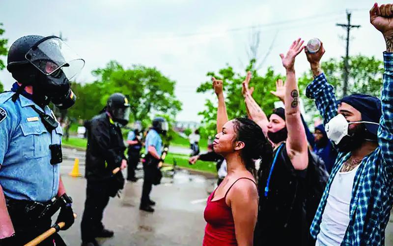 Peaceful protests such as this in one Minneapolis in 2020 try to bring the issue of how people of color are treated by law enforcement into focus.