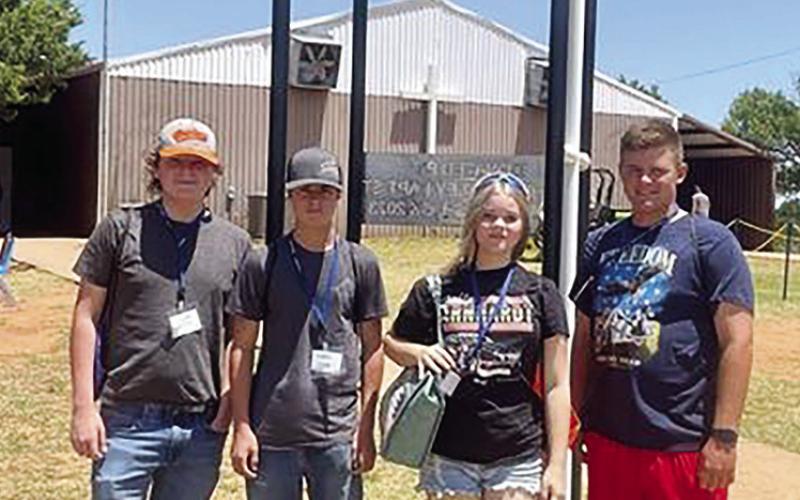 ABOVE Four members of the Calumet chapter attended the sixth session of the FFA Alumni Leadership Camp last week outside of Binger. They spent three days meeting other FFA members from across the state, while learning how to better serve their community and chapter.