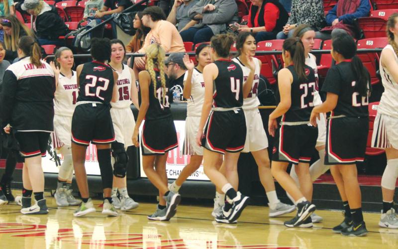 The Geary High School Lady Bison and Watonga High School Lady Eagles’ varsity basketball teams shake hands on Jan. 6 following a girls’ basketball game held at Watonga Gymnasium. All OSSAA-sanctioned activities in the state of Oklahoma have been officially canceled since March 26, including the Classes 6A-2A state basketball tournaments and all 2020 spring sports seasons. Andrew Salmi | The Geary Star