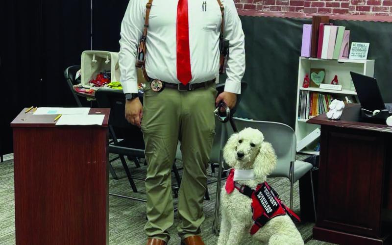 Above: Officer DeJesus and Tobi maintaining order at the Bison Boutique