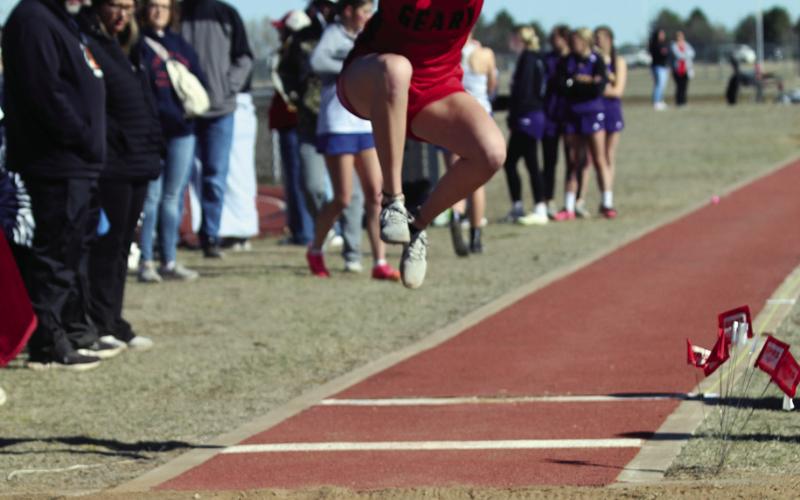 Lady Bison Mason Estep flies high in the long jump Saturday at Watonga.