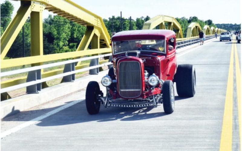 Old and new cars and motorcycles drove on the William Murray (Pony) Bridge after the ribbon cutting on May 10. The bridge had been closed for rehabilitation since November 2022. Photo by Richard Stephens