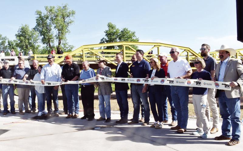 Ribbon cutting with key personnel who supported rehabilitation of the William Murray (Pony) Bridge, on May 10, 2024. The bridge had been closed for rehabilitation since November 2022.