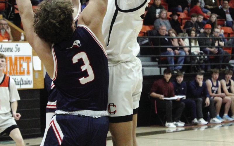 Above at left: Lila Winegart cuts past a defender Above at Right: Hezakiya Satepauhoodle gets some hang time in the face of two defenders. At left: John Sandoval outdistances a defender and heads to the hoop.