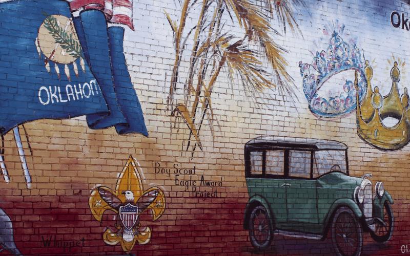 In keeping with its reputation for brilliantly painted murals and buildings, Okeene is in the running for an award from Paint Oklahoma Beautiful, an arm of Keep Oklahoma Beautiful. The project up for the accolades is the new paint job on the former blacksmith shop across the street from the Okeene Hospital. Hopes are the building will continue to be dressed up with period symbols of the smithing trade.