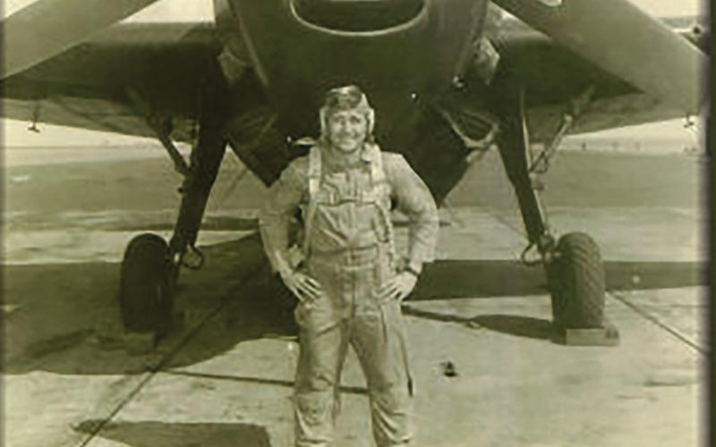 Watonga resident Coot H. Nelson with a GBF torpedo bomber.
