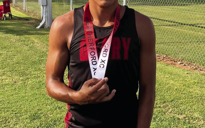 Above Left: Rylan Peralta continued his top five streak from last season with an incredible fourth place finish. Above right:The Geary High School cross country teams ran in their season opening meet at Weatherford Saturday. The girls’ team finished 6th out of 19 schools. Randi Upchego was the top Geary girls’ runner placing 33rd. Each runner for the boys’ team made his high school debut. Both high school and middle school teams will compete at Watonga Saturday.