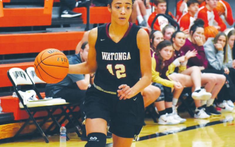 Kiyla Cooper dribbles up the court for Watonga. Brenda Geels Watonga Republican