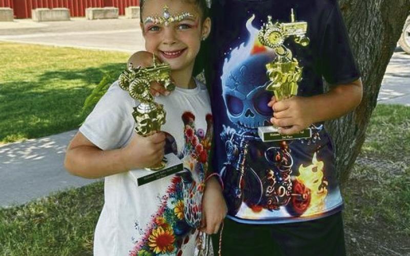 ABOVE: Celebrating a couple kiddos going to The National Pedal Pull in Mitchell, South Dakota at the end of the month. Saturday, September 7, at the State Pedal Pull in Norman, 5-year-old Randi Garrett won third place and 8-year-old Dillinger Garrett won second place.