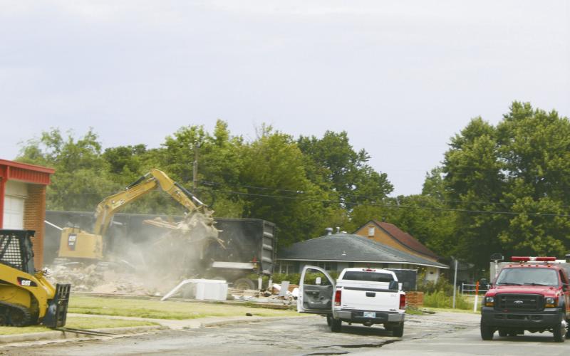 Demo crews are at work on the site of the former Watonga Middle School. The crews are taking down the old administration building, the old band room and the cafeteria. The remainder of the campus will remain standing and much of it repurposed for school use.