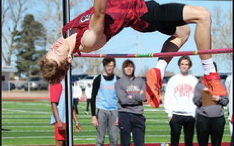 Above: Nick Walker shows good form at the high jump