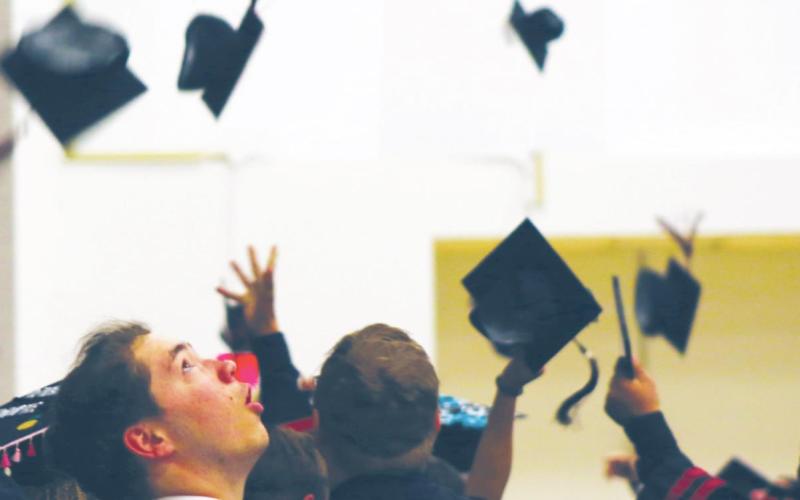 Last year’s graduating seniors from the Watonga High School Class of 2019 fling their caps in the air at the conclusion of the ceremonies, a traditional celebration of the transition from high school student to young adult. Connie Burcham Watonga Republican