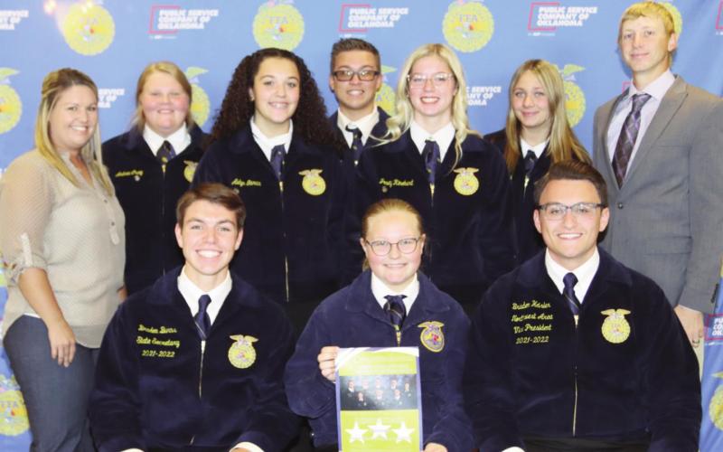 Photo left: Standing in the back are Watonga FFA officers; Sitting in the front row, far left, is Braden Burns, Kingfisher, state secretary. Sitting in the front row, far right, is Braden Heisler, Waukomis, northwest area vice-president