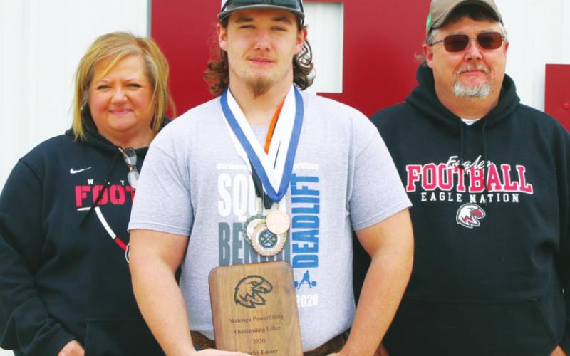 Watonga High School varsity powerlifting 242-pound junior Kerby Easter with his parents Christy and Jerry Easter. Kerby was a state qualifier for the Eagles alongside Wiggins.