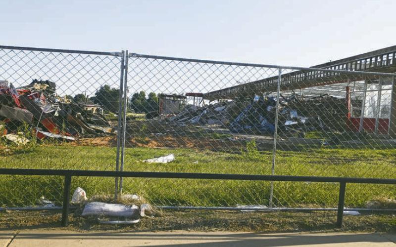(ABOVE) The remainder Monday of the old Geary High School. The district is working with the insurance company and the architects to determine what they can build with the money they have.