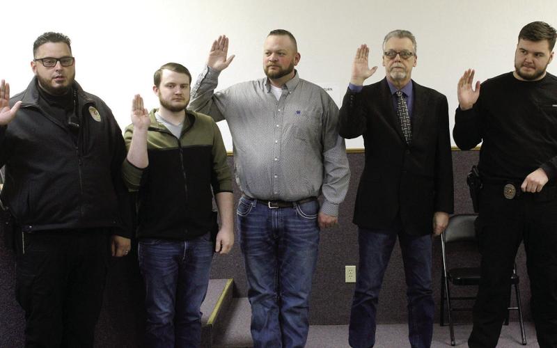 The City of Geary swore in five new police officers March 1. Shown are (L-R) Jonathon DeJesus, school resource officer, Dalton Errigo, reserve patrol officer, Adam Hopper, patrol officer, John Smith, patrol officer and Levi Johnston, patrol officer. The additions bring the department up to a fully staffed level for the first time in recent memory.