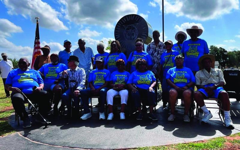 Dunbar Alumni reunite in front of the Dunbar Memorial on Saturday, June 20, 2026. at Legion Park.