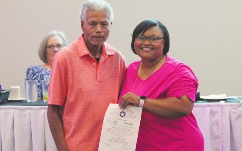 Carla Flynn presents Carl King with the 2020 Citizen of the Year award at the annual Watonga Chamber of Commerce banquet on Monday, Aug. 30, at Lucky Star.