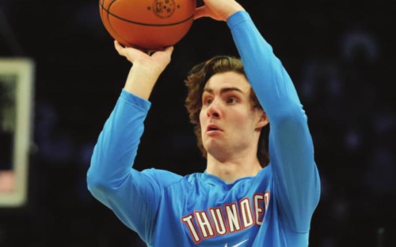 Josh Giddey warms up before playing during the Rising Stars Challenge. (Kyle Terada-USA TODAY Sports )