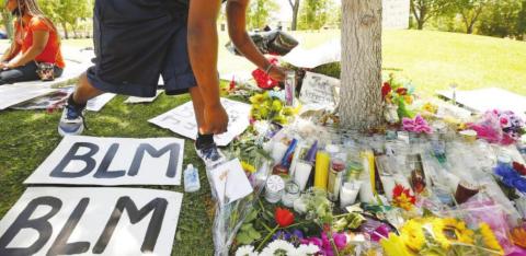 A memorial for Robert Fuller sits in Poncitlan Square next to Palmdale City Hall, Cali. in June 2020. Associated Press Watonga Republican