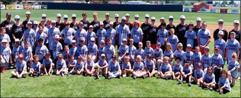 ABOVE In spite of some less than cooperative weather, the Calumet baseball camp was well attended and judging by these youngsters’ smiles, a good time was had by those in attendance.