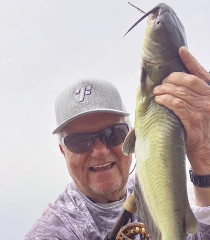 (ABOVE)Tom Friedermann with a channel catfish caught at Lake Arcadia. Share your photos with us!