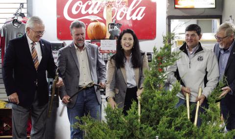 Local and state dignitaries ceremonially chopped eastern red cedars Oct. 25 at Canton for the kick off of the eradication program to restore water flow to the lake. Shown are (L-R) Oklahoma Sen. Darcy Jech, Rep. Mike Dobrinski, Oklahoma Sec. of Agriculture Blayne Arthur, and Rep. Carl Newton of Cherokee.