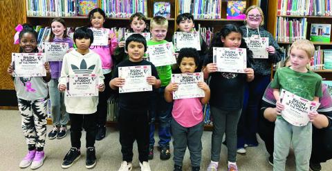 Above: Bison Elementary School Students of the month. Below, Left: Jaiden Woods and Rylan Peralta showing their awards from the SWOSU Shootout at Weatherford. Below at right: Randi Upchego, Rosie Pineta, Aubrey Lawson and Tonya Olsen with their awards as well.