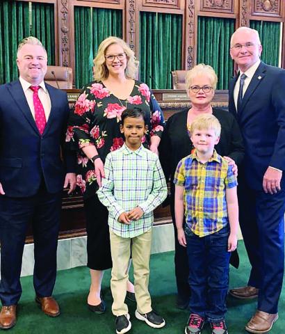 Watonga first graders J.T O’Dell and Treyson Harper were honored for winning first place in writing and art in the OBA Law Day contest. The young men met Sen. Darcy Jech and Rep. Mike Dobrinski. Chief Justice John Kane IV presented their awards at the Oklahoma State Capitol. Shown are (L-R) Watonga Superintendent Kyle Hilterbran, teacher April Schrader, teacher Micki Urbanczyk, Sen. Jech, J.T. O’Dell and Treyson Harper.