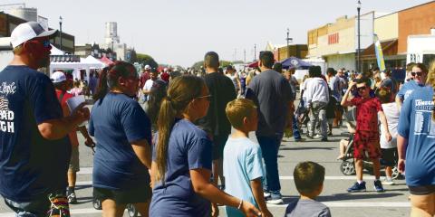 A good crowd showed up for the parade and festivities on Saturday, October 12. Cecil Gray kept the blues away down at Centennial Park and the Kidzone boasted mile-long lines.