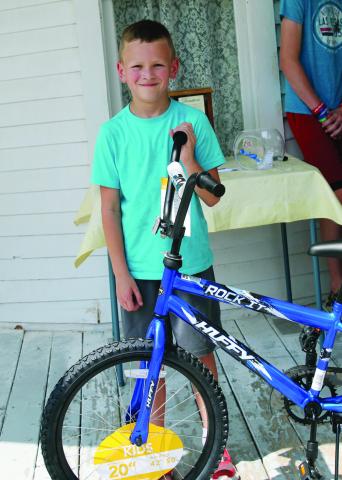 Bike Winner Dylan Ford was the winner Saturday of the boy’s bicycle at the Ferguson Home Museum event. In addition, he will also recieve a helmet.