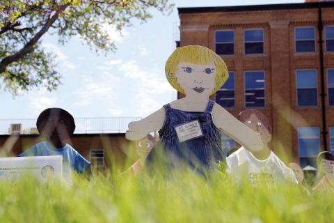 The wooden chidlren scattered around Watonga represent the child abuse and neglect cases investigated in Blaine County this year. But they also respresent the hope that CASA offers to the youngest victims.