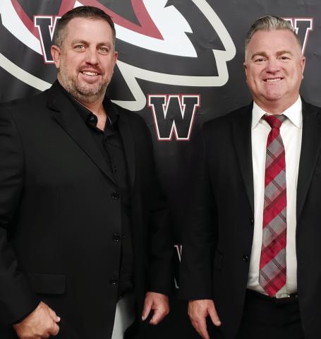 Matt Walter with Watonga Superintendent Kyle Hilterbran. Walter was named head football coach Monday night.