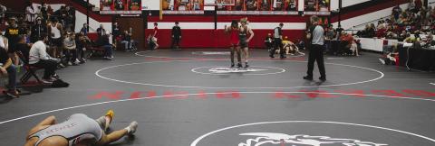 The action was nonstop at the Geary Invitational. The newly revamped gym features a whole-floor mat with space enough for three matches to take place at once.