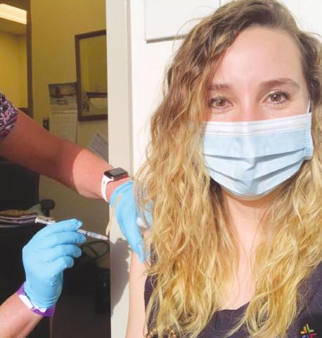 Registered nurse Casandra Oakes receives her first dose of the COVID vaccine. (Photo Provided)