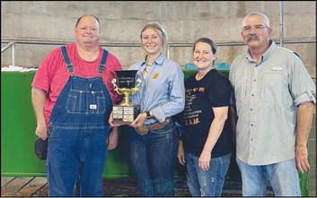 Pictured with Amanda is Don Mitchell, Canton ag teacher, and her parents James and Melinda Schoonmaker.