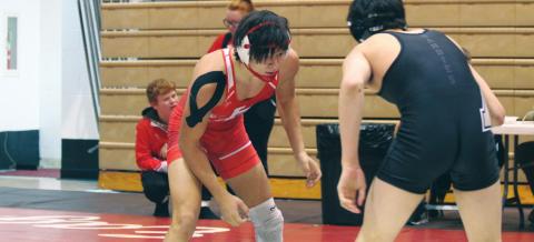 (Above) Hinton High School varsity wrestling senior Trenton Lusk looks to make his next move against an opponent on Dec. 6, 2019, at the Max Dippel Memorial wrestling tournament held at Weatherford High School. On March 30, it was announced that Lusk had made the 3A West 2020 All-Star Wrestling Team in the 152-pound weight class. ANDREW SALMI/HINTON RECORD