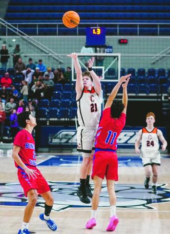 (AT LEFT) Almost one year ago, Kingston Arnold drained a buzzerbeating three pointer to lift the Chieftains over Binger-Oney 54-52 for the Washita Valley Conference Championship. Photo courtesy Dillon Young